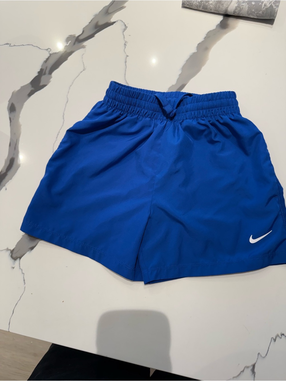 Nike Royal Blue Kids Athletic Shorts with White Swoosh